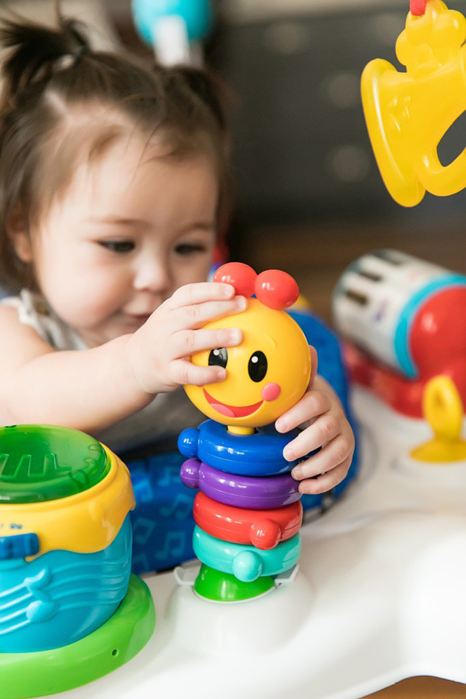 BABY EINSTEIN Skákadlo/aktívne centrum 2v1 Neighborhood Symphony 6m+ do 11 kg