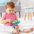 SKIP HOP Hračka hudobná telefón Dinosaurus 6m+