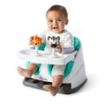 BABY EINSTEIN Podsedák na stoličku s 2 hračkami 2v1 Dine&Discover 6m+ do 23 kg