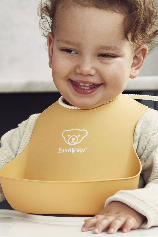 BABYBJÖRN Podbradník Baby 2 ks púdrovo žltá/púdrovo zelená