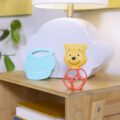 BRIGHT STARTS Hryzačka s hrkálkou Winnie the Pooh™ Hunny & Shake™ 2ks, 0m+