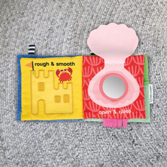 BABY EINSTEIN Mäkká kniha plná aktivít Ocean Opposites™, 0m+