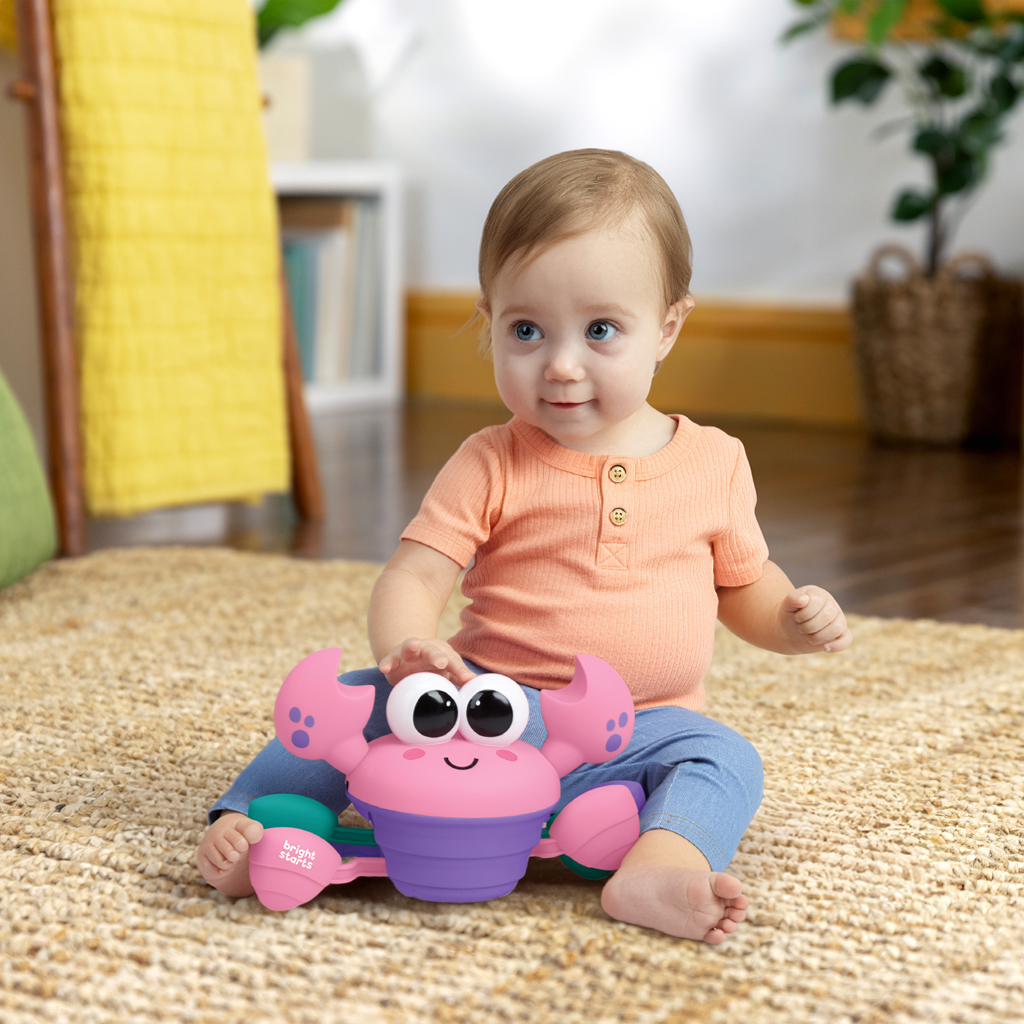 BRIGHT STARTS Hračka hudobná a multisenzorická Rockin' Crawling Crab™ - Pink, 6m+